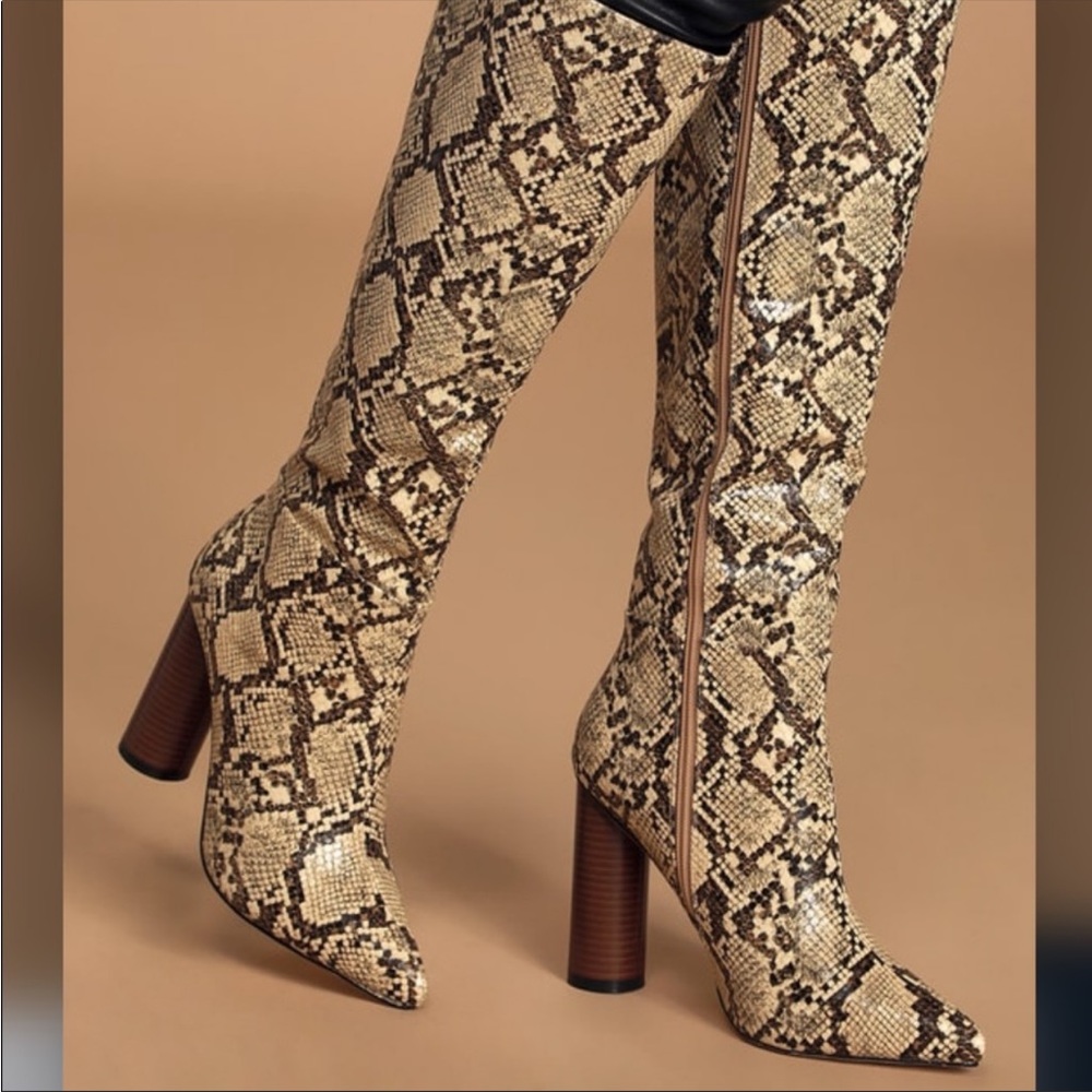 Raid snake print knee high boots. Size 9. Worn once